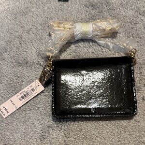 Black Patent Leather wallet
Victoria’s Secret